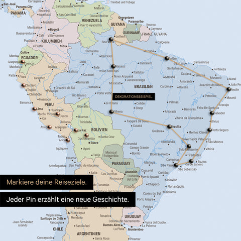 Detail of a political push pin world map with pins, showing a mapped out travel route in South America through the countries of Brazil, Peru and Ecuador