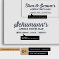 Pinnwand Leinwand einer Afrika-Karte in Denim Blue mit Personalisierung als Logo mit Familiennamen und Legende