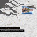 Benelux map in dark gray as a canvas for pinning shows a section of Zealand, East Flanders, and Antwerp with many details such as national parks, rivers, and numerous small towns and cities, some of which are marked with pins