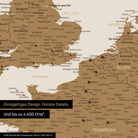 Europe map in bronze as a canvas for pinning shows a section of England, France, and Belgium with many details such as national parks, rivers, and numerous small towns and cities, some of which are marked with pins