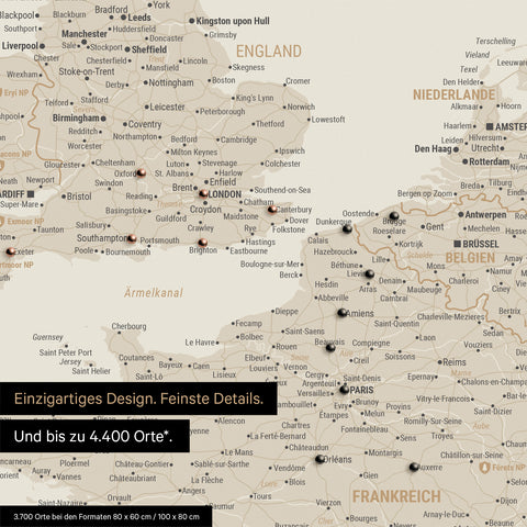 Europe map in gold as a canvas for pinning shows a section of England, France, and Belgium with many details such as national parks, rivers, and numerous small towns and cities, some of which are marked with pins