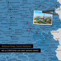 France map in blue as a canvas for pinning shows a section of Auvergne-Rhône-Alpes with many details such as national parks, rivers, and numerous small towns and cities, some of which are marked with pins