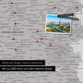 France map in light gray as a canvas for pinning shows a section of Auvergne-Rhone-Alpes with many details such as national parks, rivers, and numerous small towns and cities, some of which are marked with pins
