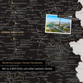 France map in Light Black as canvas for pinning shows a section of Auvergne-Rhone-Alpes with many details such as national parks, rivers, and numerous small towns and cities, some of which are marked with pins