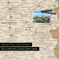 France map in Treasure Gold as canvas for pinning shows a section of Auvergne-Rhone-Alpes with many details such as national parks, rivers, and numerous small places and towns, some of which are marked with pins