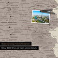 France map in warm gray as a canvas for pinning shows a section of Auvergne-Rhone-Alpes with many details such as national parks, rivers, and numerous small towns and cities, some of which are marked with pins