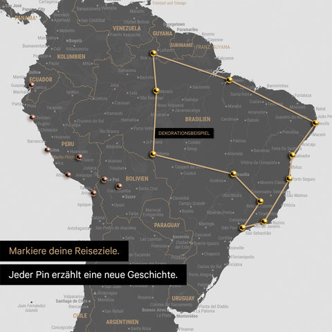 Detail of a push pin world map in Light Gray with pins, showing a mapped out travel route in South America through the countries of Brazil, Peru and Ecuador