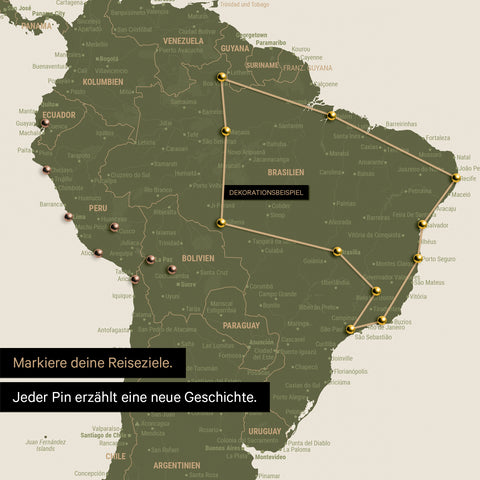 Detail of a push pin world map in Olive Green with pins, showing a mapped out travel route in South America through the countries of Brazil, Peru and Ecuador
