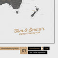 Personalized world map in light gray color with your name printed on it