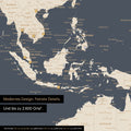 Section of a magnetic world map in Hale Navy (dark blue-gold) showing a map of Asia, with magnets marking travel destinations