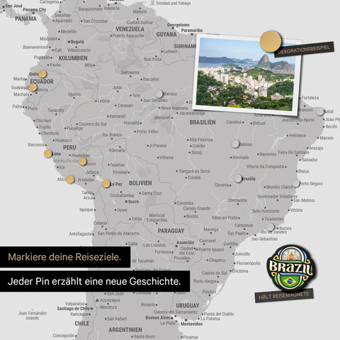 Detail of a magnetic world map as a light gray magnetic board showing South America with a pinned photo as well as travel and vacation magnets