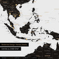 Section of a magnetic world map in Light Black (White Black) showing a map of Asia, with magnets marking travel destinations