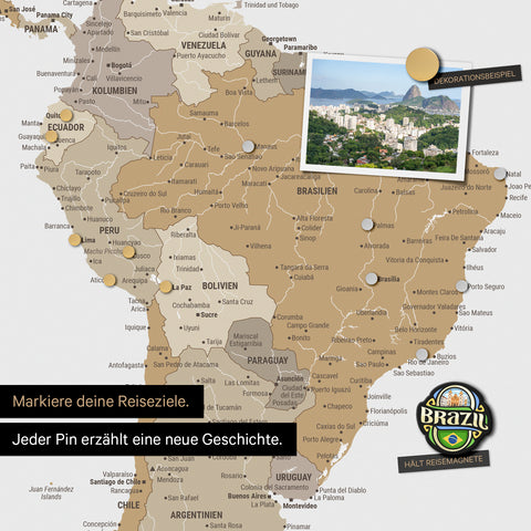 Detail of a magnetic world map as a magnetic board in multicolor beige showing South America with a pinned photo as well as travel and vacation magnets