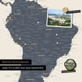 Detail of a magnetic world map as a magnetic board in Multicolor Navy Light showing South America with a pinned photo as well as travel and vacation magnets