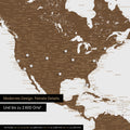 Pinning travel destinations on a magnetic world map as a brown magnet poster