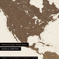 Pinning travel destinations on a magnetic world map as a magnet poster in multicolor brown