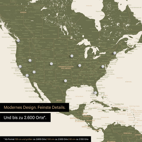 Pinning travel destinations on a magnetic world map as a magnet poster in olive green