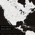 Pinning travel destinations on a magnetic world map as a black and white magnet poster