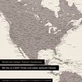 Pinning travel destinations on a magnetic world map as a magnet poster in Warmgray (brown-gray)